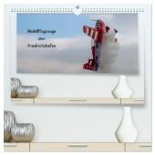 Modellflugzeuge über Friedrichshafen (hochwertiger Premium Wandkalender 2024 DIN A2 quer), Kunstdruck in Hochglanz: Impressionen von der Flugshow im Rahmen der Modellbaumesse in Friedrichshafen. Modellflugzeuge über Friedrichshafen (hochwertiger Premium Wandkalender 2024 DIN A2 quer), Kunstdruck in Hochglanz: Impressionen von der Flugshow im Rahmen der Modellbaumesse in Friedrichshafen.